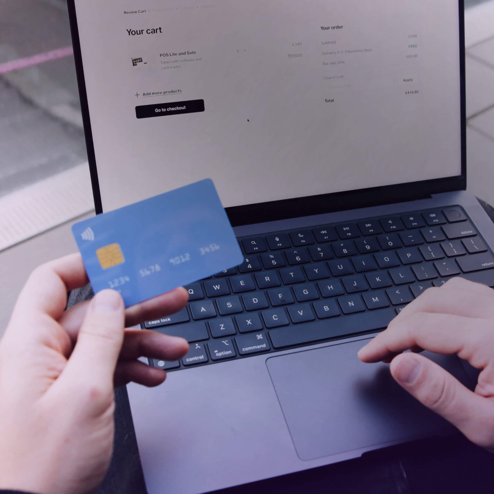 A person in doubt whether to enter their credit card details on a website or not