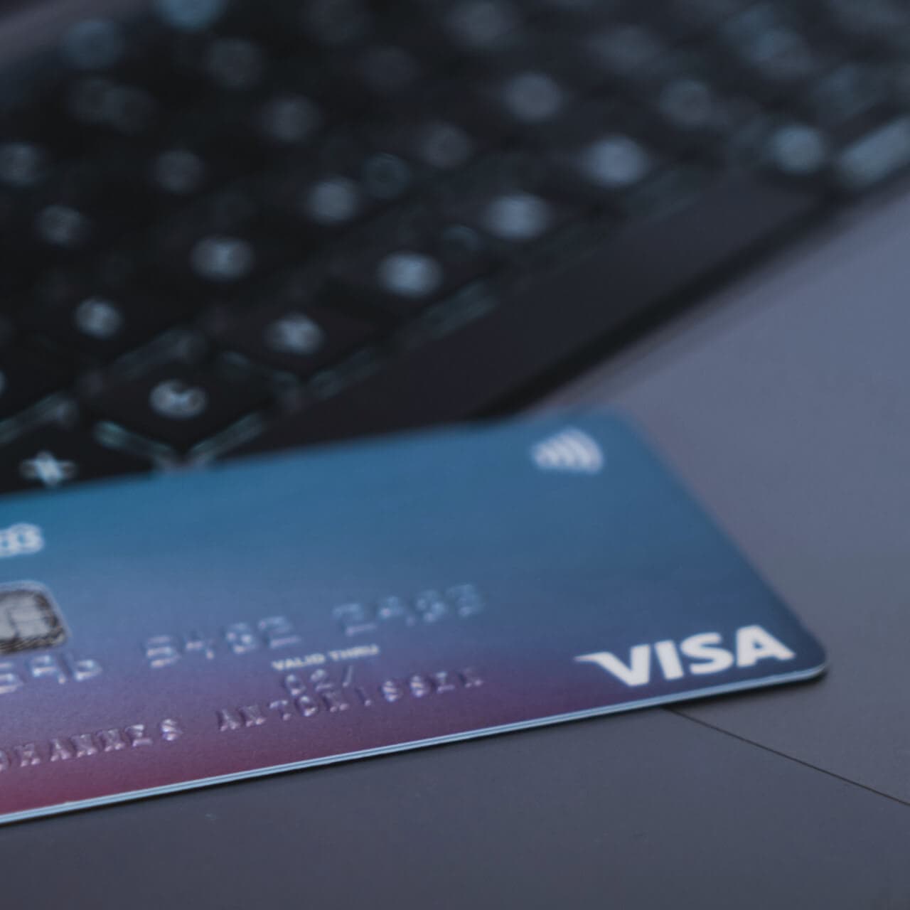 Close up photo of a credit card on a laptop