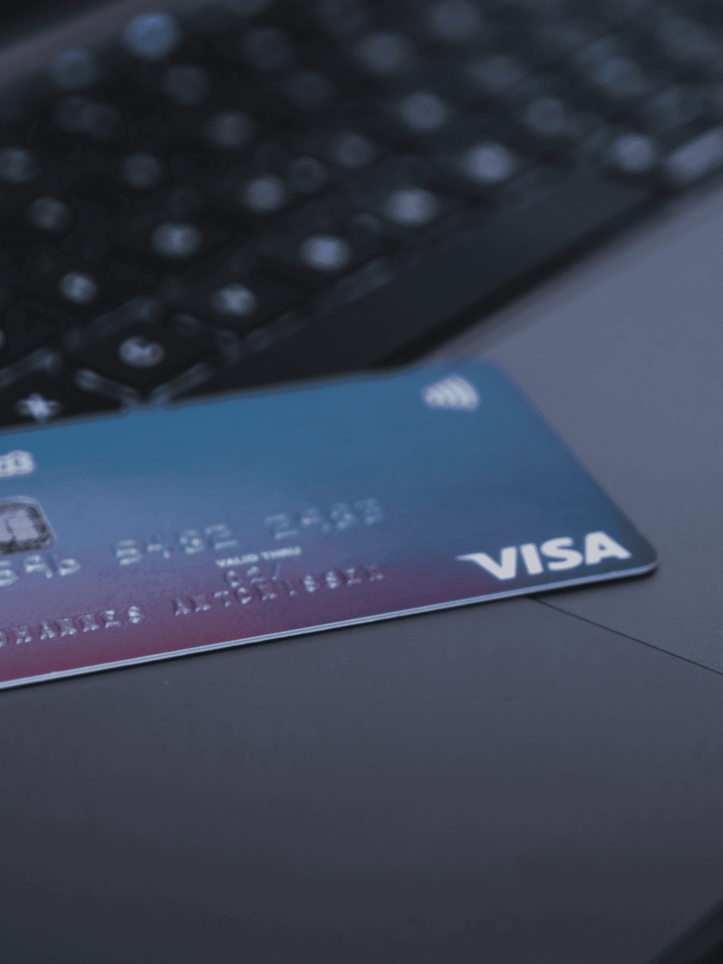 Close up photo of a credit card on a laptop